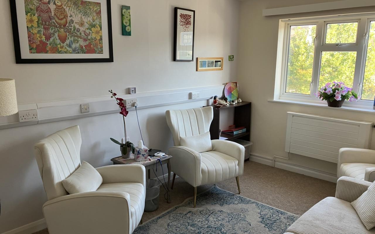 Counselling room with white chairs